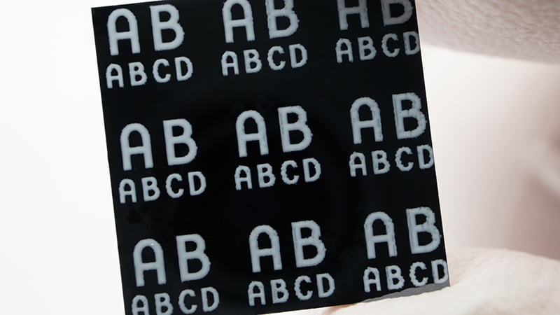 An example of a product model number printed on the surface of a silicon chip using Tabby Print with marking ink.